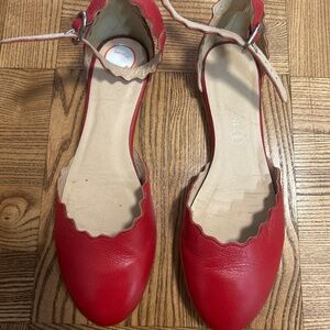 Red leather flats